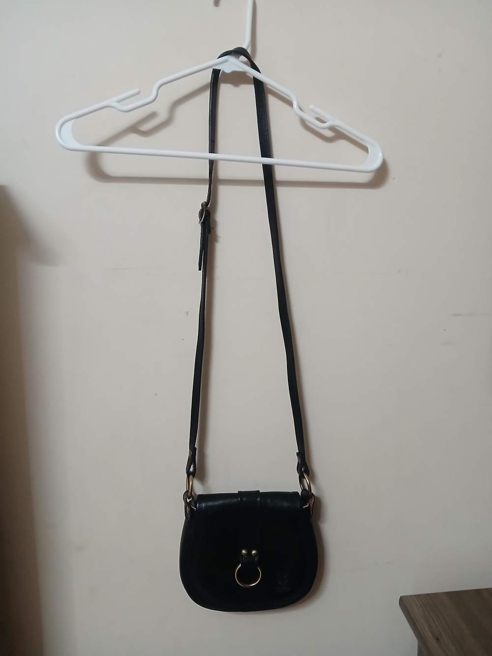 Black Leather Crossbody Bag with Gold Ring Detail